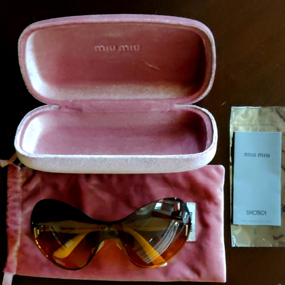 MIU MIU sunglasses Brown shade.